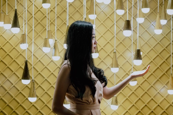 women looking at lights